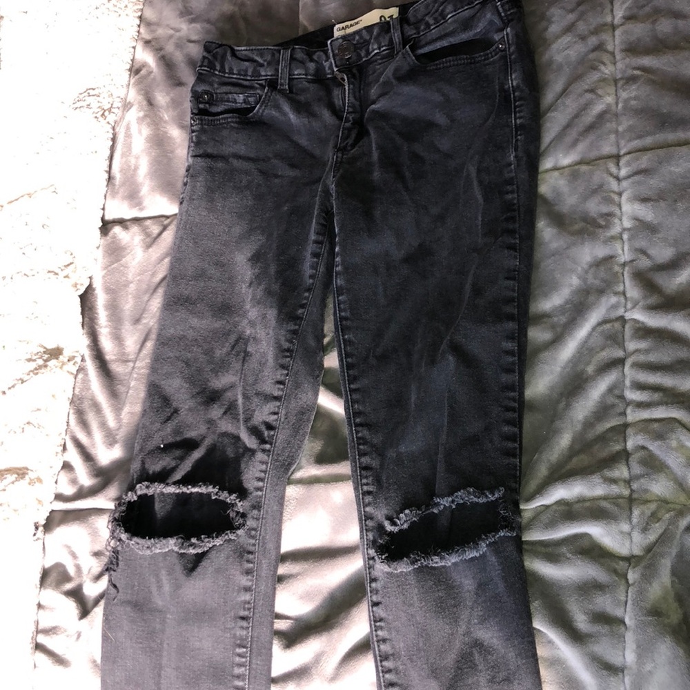 Used ripped black jeans